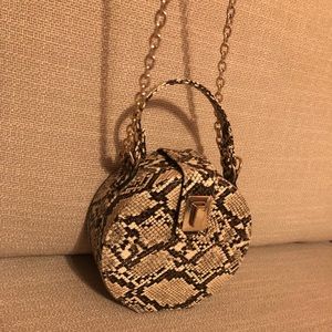 Snake print circle Bag